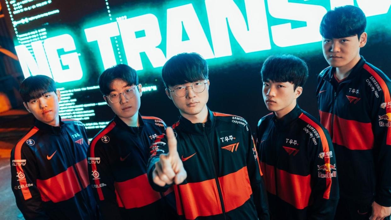 South Korean League of Legends squad T1 posing in front of an LED screen. (Photo: Riot Games)