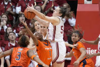 Indiana forward Mackenzie Holmes (54) fights for a rebound with Illinois guard Genesis Bryant (1) in the second half of an NCAA college basketball game in Bloomington, Ind., Sunday, Dec. 4, 2022. Indiana won 65-61. (AP Photo/AJ Mast)