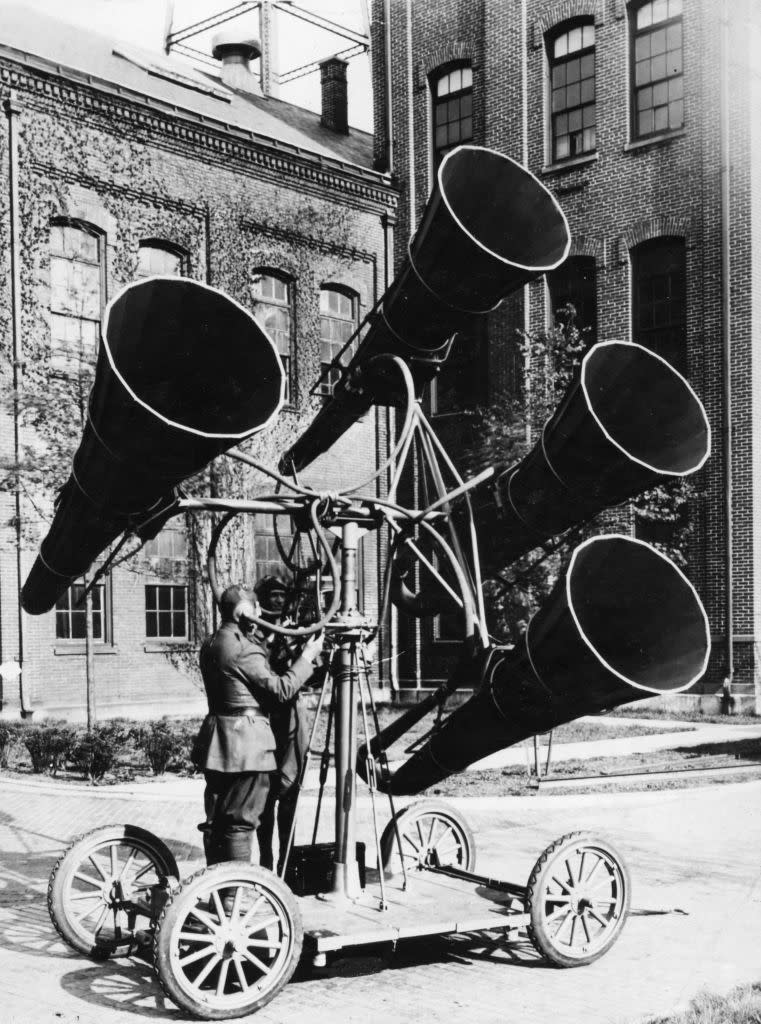 a person using a device to listen to planes