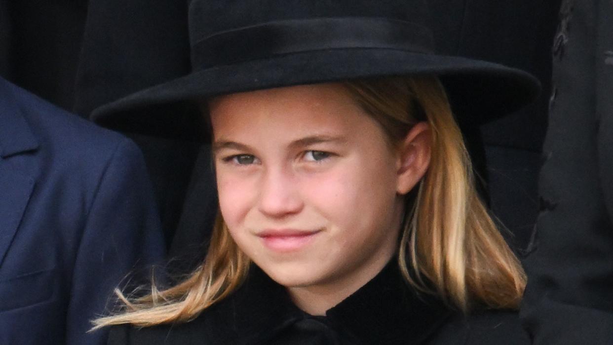 LONDON, ENGLAND - SEPTEMBER 19: Prince George of Wales, Catherine, Princess of Wales and Princess Charlotte of Wales during the State Funeral of Queen Elizabeth II at Westminster Abbey on September 19, 2022 in London, England.