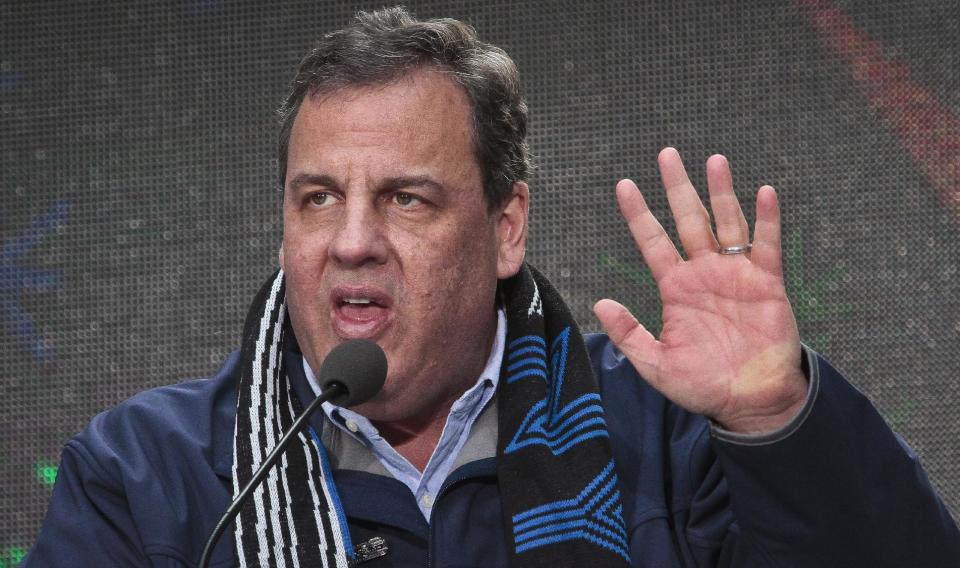 New Jersey Gov. Chris Christie speaks during a ceremony to pass official hosting duties of next year's Super Bowl to representatives from Arizona, Saturday Feb. 1, 2014 in New York. Fellow Republicans are assessing the damage of new allegations that Gov. Christie knew about a traffic-blocking operation orchestrated by top aides. (AP Photo/Bebeto Matthews)