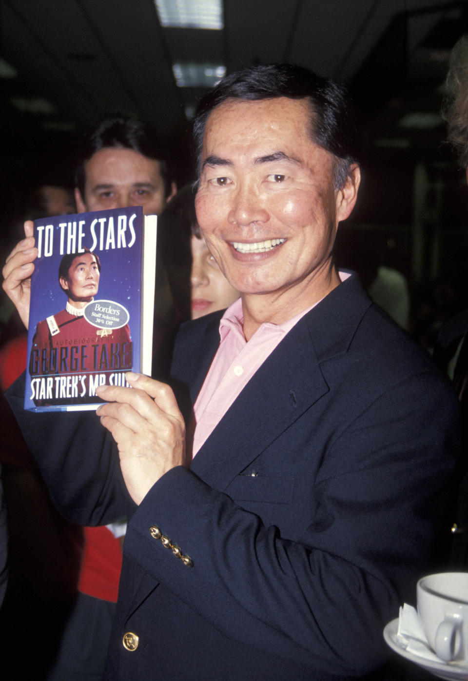 George Takei signs his autobiography, <i>To the Stars</i>, at Borders Bookstore in Miami in 1994.