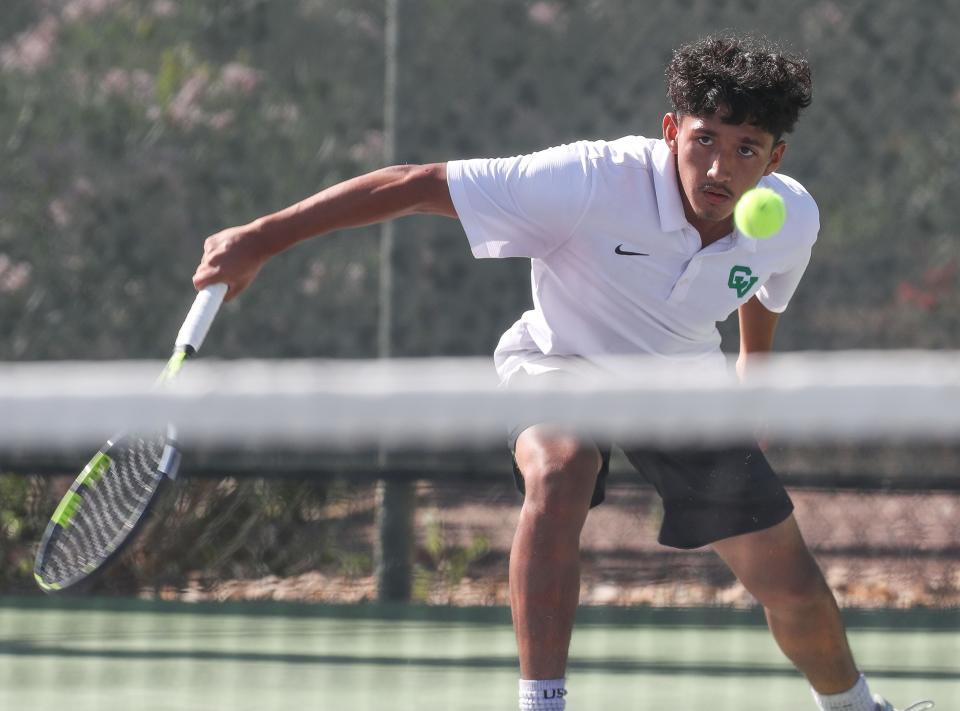 Edgar Avila of Coachella Valley plays in the DVL singles semifinal against Paul Tummoscheit of Desert Hot Springs, April 24, 2024 in Palm Desert, Calif.