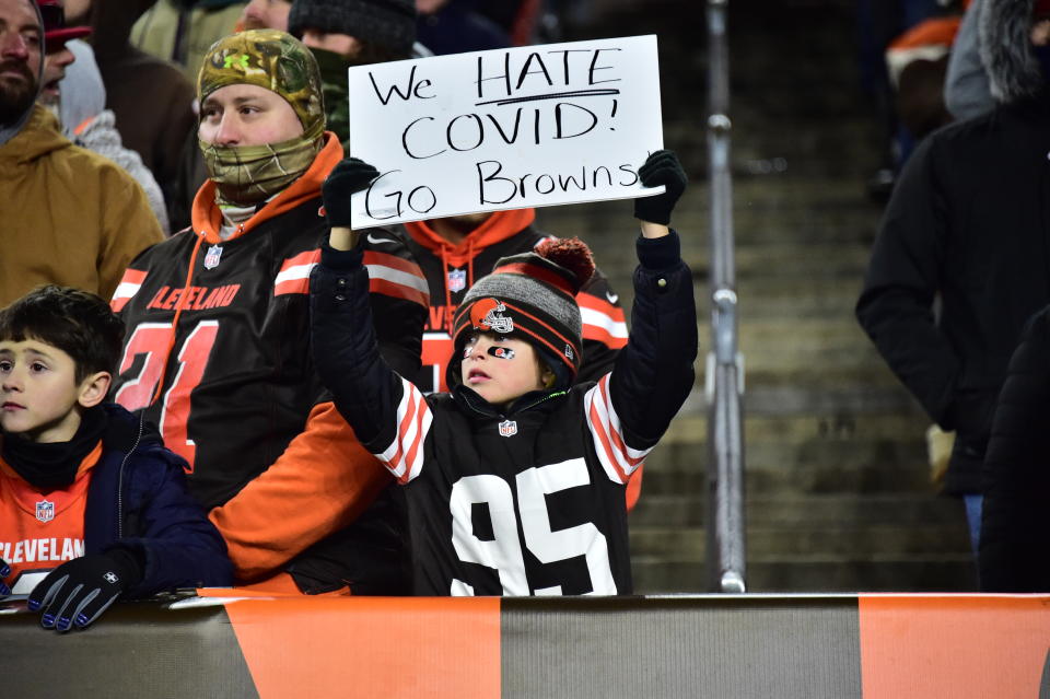 A young fan holds a sign during the second half of the game between the Cleveland Browns and the Las Vegas Raiders at FirstEnergy Stadium on December 20, 2021 in Cleveland. (Photo by Jason Miller/Getty Images)