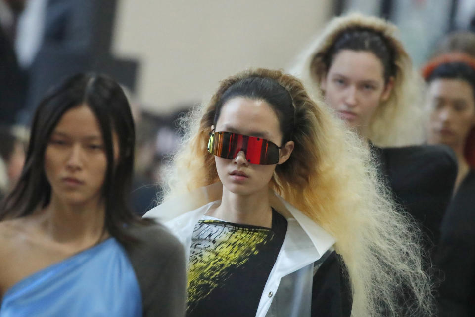 Models wear creations for the Rick Owens fashion collection during Women's fashion week Fall/Winter 2020/21 presented in Paris, Thursday, Feb. 27, 2020. (AP Photo/Francois Mori)