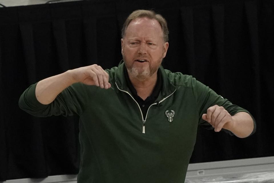 Milwaukee Bucks head coach Mike Budenholzer reats during the first half of Game 1 of their NBA basketball first-round playoff series against the Miami Heat Saturday, May 22, 2021, in Milwaukee. (AP Photo/Morry Gash)