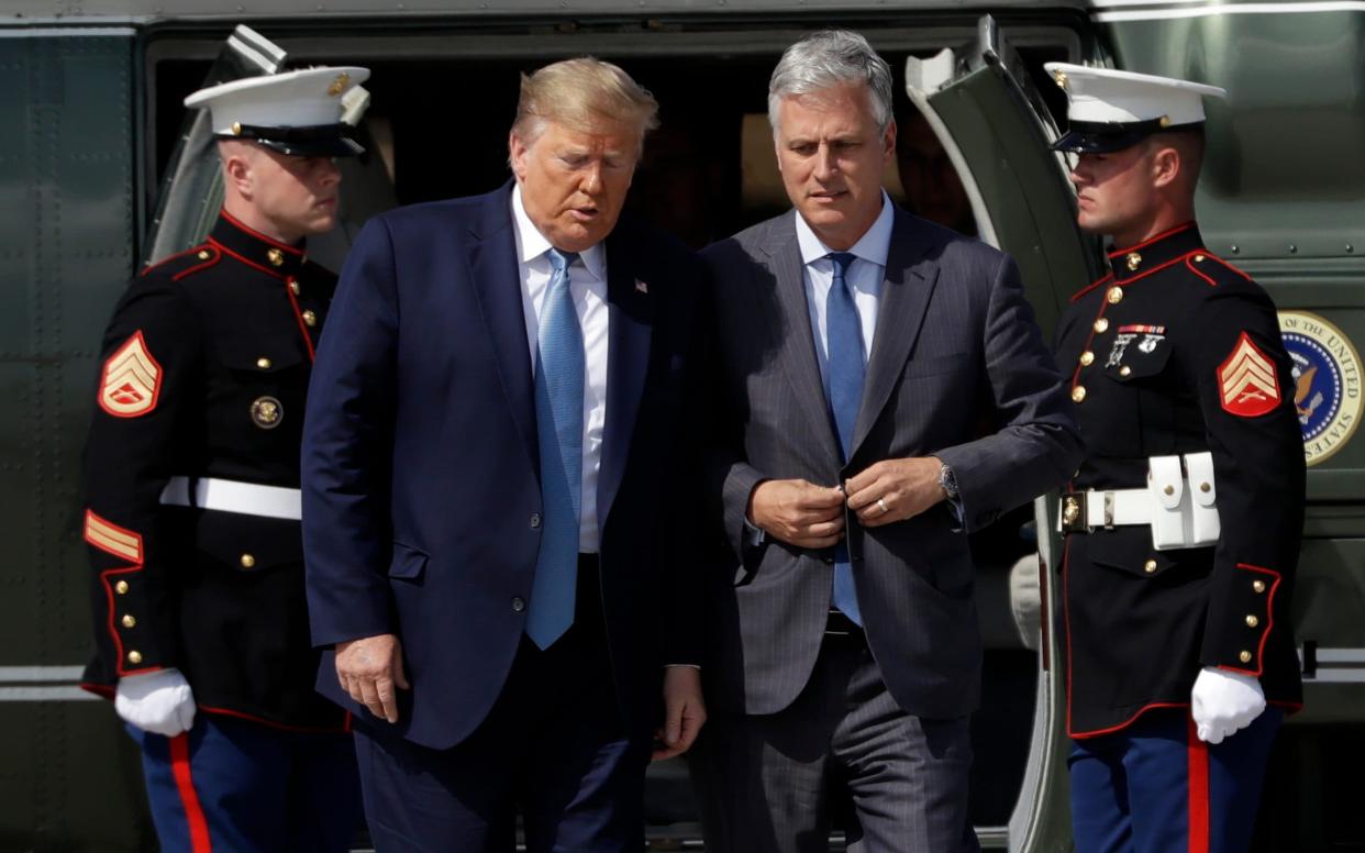 President Donald Trump walks Robert O'Brien, just named as the new national security adviser, at Los Angeles International Airport on Wednesday in Los Angeles - Copyright 2019 The Associated Press. All rights reserved.