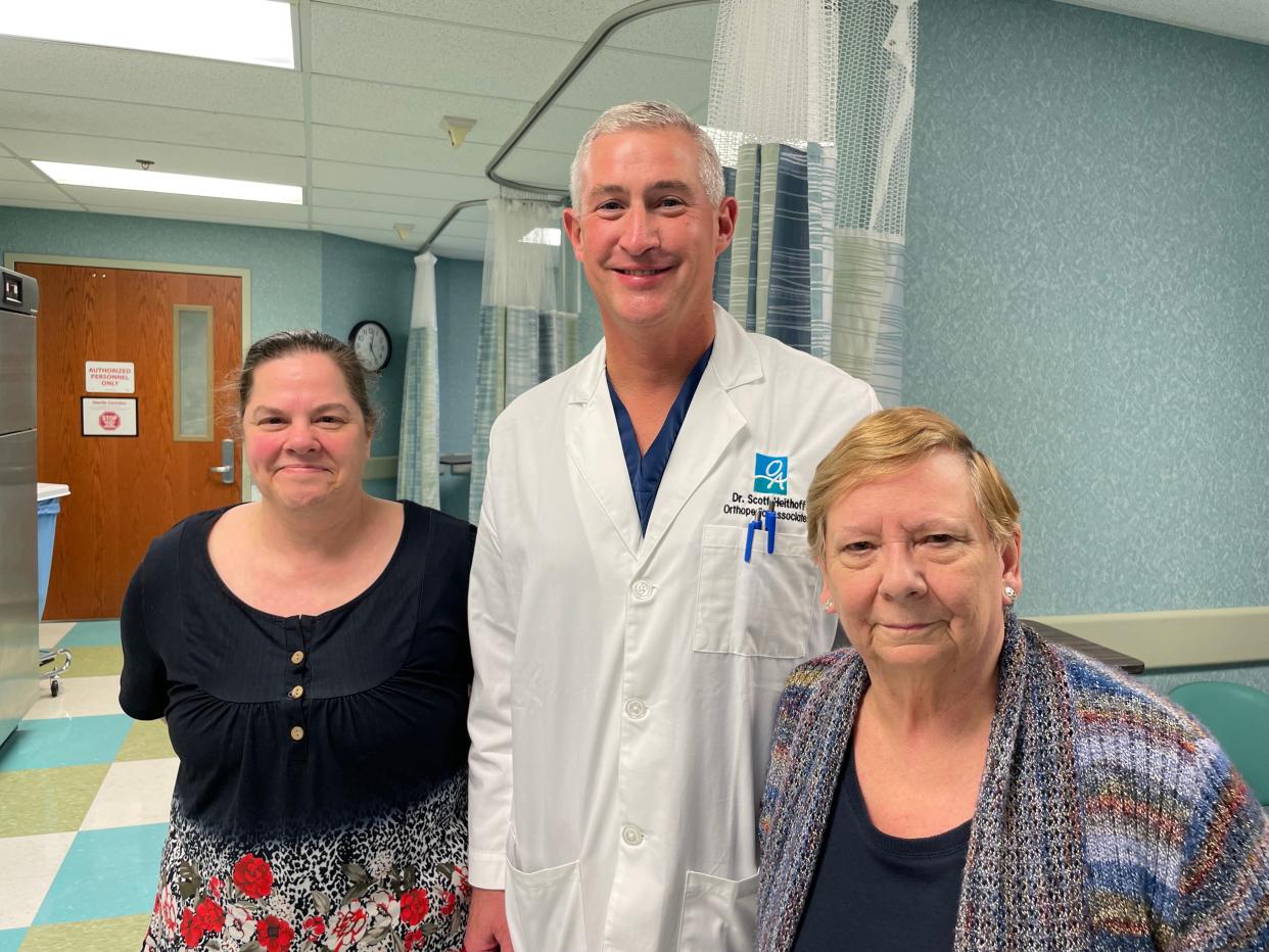 From left to right: Tonya Tobias, Dr. Scott Heithoff and Dorcas Tobias on May 10, 2024. Tonya and Dorcas, who are a daughter and mother-in-law duo are getting knee surgery together, which will be performed by Dr. Heithoff.