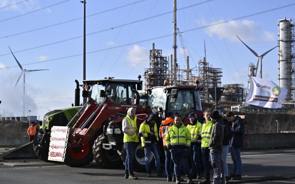 Farmers gather for a protest action at the Kallo lock near the Port of Antwerp, Jan 31