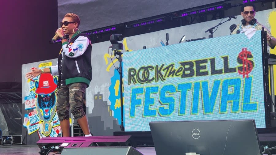 MC Lyte (center) rocks the mic as Kid Capri (right) keeps the music going during the Rock The Bells Festival on Aug. 5 in Queens. (Photo by Matthew Allen)