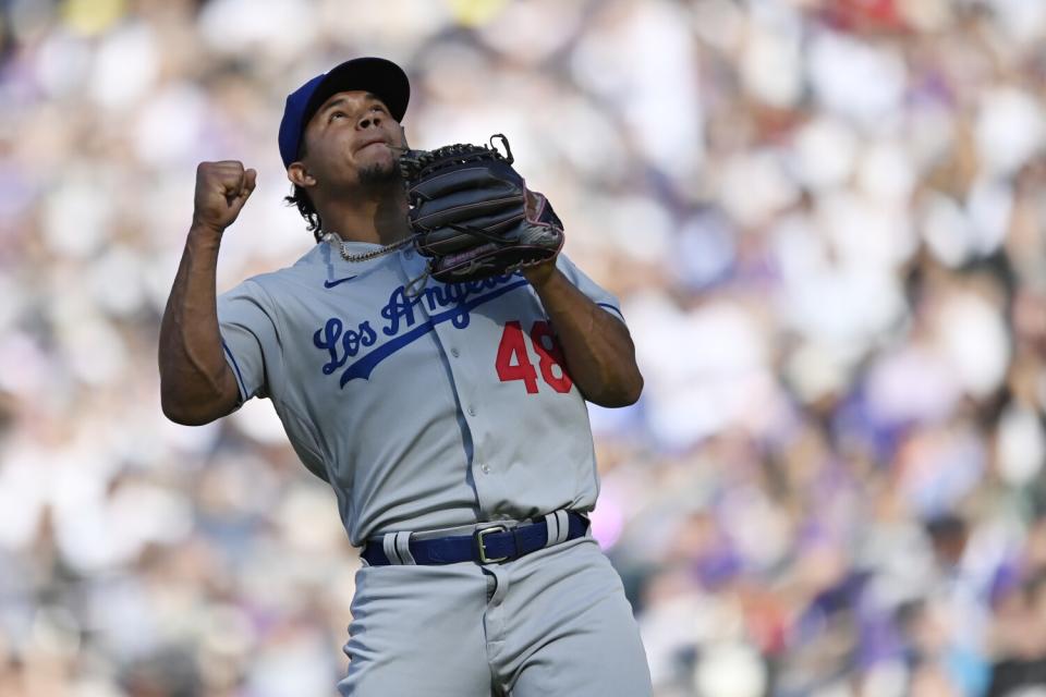 Dodger Brusdar Graterol reacts after pitching in the sixth inning against the Colorado Rockies at Coors Field