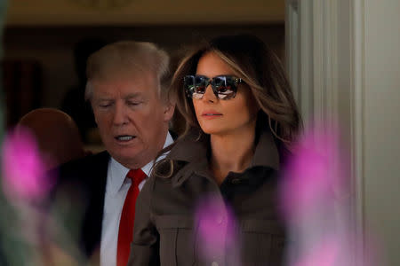 U.S. President Donald Trump and first lady Melania Trump leave the Oval Office of the White House during their departure for Bedminster, New Jersey, in Washington, DC, U.S., September 15, 2017. REUTERS/Carlos Barria/File Photo