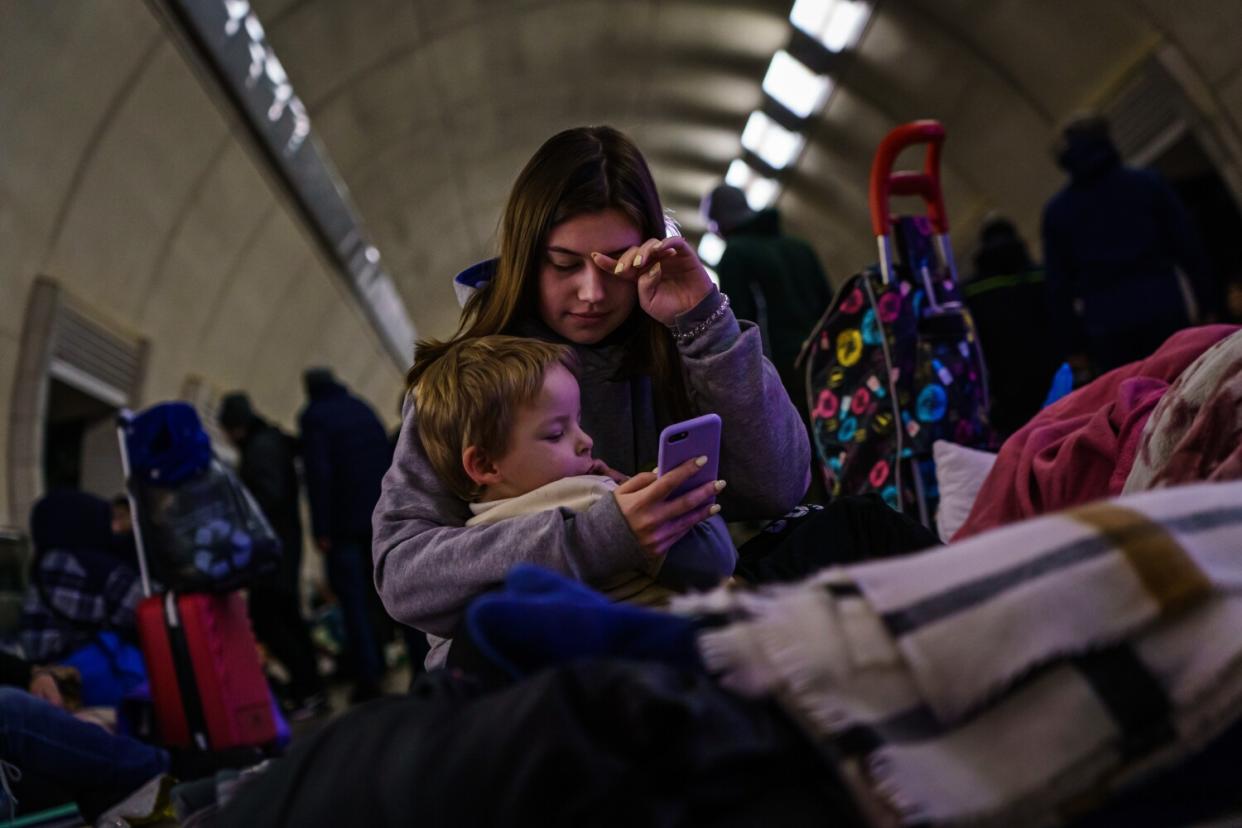 Lena from Kyiv, takes care a child named Max, 3, whom she has only known for a few days