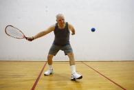 Ed Robles, an 88-year-old Retired Senior Volunteer Patrol member, plays racquet ball at 24 hour fitness in San Diego, California, United States March 17, 2015. (REUTERS/Mike Blake)