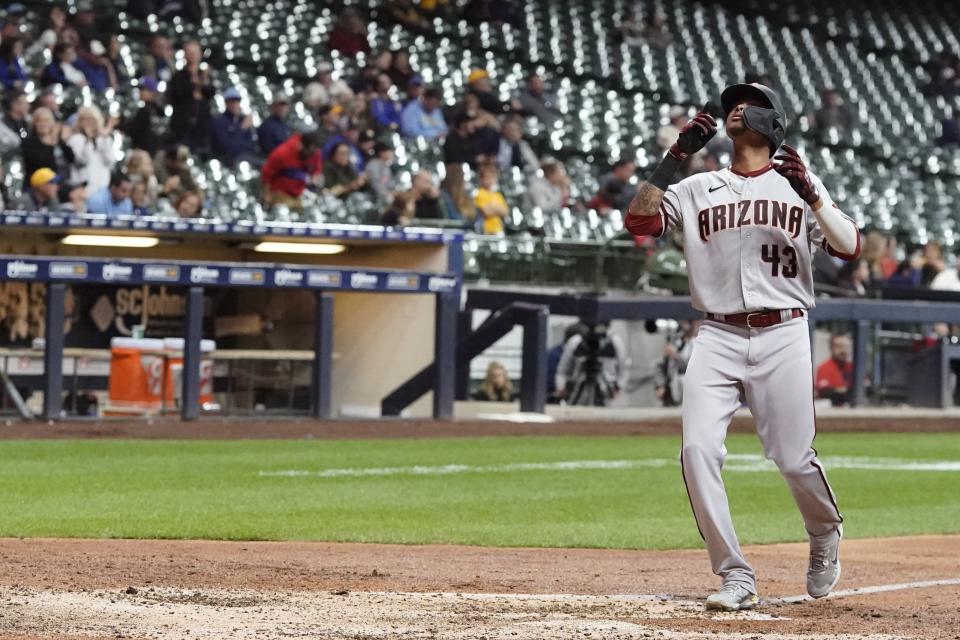 Arizona Diamondbacks' Sergio Alcantara reacts after hitting a two-run home run during the seventh inning of a baseball game against the Milwaukee Brewers Monday, Oct. 3, 2022, in Milwaukee. (AP Photo/Morry Gash)