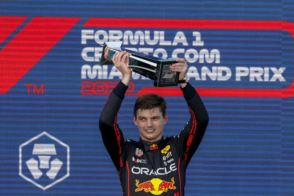 MIAMI GARDENS, FLORIDA - MAY 08: Belgian-Dutch driver Max Verstappen of Red Bull Racing receives a trophy on the podium after winning the Formula One Grand Prix of Miami at the Miami International Autodrome on May 08, 2022 in Miami Gardens, Florida. (Photo by Eva Marie Uzcategui Trinkl/Anadolu Agency via Getty Images)