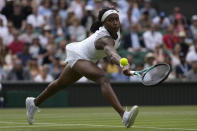 Coco Gauff of the US returns the ball to Amanda Anisimova of the US in a third round women's singles match on day six of the Wimbledon tennis championships in London, Saturday, July 2, 2022. (AP Photo/Alastair Grant)