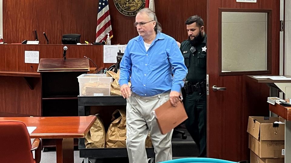 Asbury Lee Perkins enters the courtroom at the Indian River County Courthouse on Oct. 19, 2022, before a jury returned a verdict convicting him of first-degree murder with a firearm in the November 2015 shooting death of his former wife Cynthia Betts.