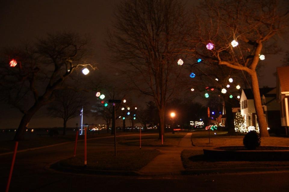 Every year, homeowners in the Port Huron neighborhood of Sherman Woods hang balls made from Christmas lights and set up Christmas decorations in their neighborhood.