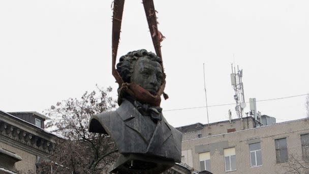 PHOTO: In this Dec. 19, 2022 file photo municipal service workers dismantle a monument to a Russian poet Alexander Pushkin in Dnipro, Ukraine. (Mykola Myakshykov/AP, FILE)