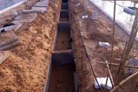 Graves are prepared at the cemetery for migrants who have died trying to reach Europe, in the village of Zarzis, Tunisia, Saturday June 12, 2021. A newly sanctified cemetery for Tunisia's migrant dead is filling quickly. Rachid Koraïchi bought the plot of land in the port city of Zarzis a few years ago and started designing what he hoped would be the final resting place for people who died on the move. (AP Photo/Mehdi El Arem)
