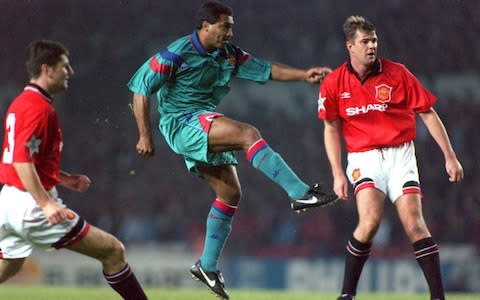 Romario in action against Manchester United at Old Trafford in 1994 - Credit: GETTY IMAGES