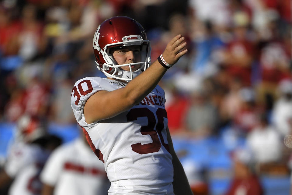 FILE - In this Saturday, Sept. 14, 2019 file photo, Oklahoma place kicker Calum Sutherland lines up a kick during the first half of an NCAA college football game against UCLA in Pasadena, Calif. Early Saturday, Sept. 21, 2019, Sutherland was arrested on a public intoxication charge, according to records from the Cleveland County Sheriff's Office in Norman, Okla. (AP Photo/Mark J. Terrill)