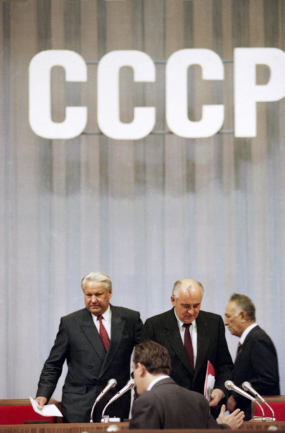 FILE - President of the Russian Federation Boris Yeltsin, left, and Soviet President Mikhail Gorbachev enter the podium at the start of the closing session of the Congress of People's Deputies in Moscow, Russia on Sept. 5, 1991. While Gorbachev was taking desperate efforts to negotiate a new "union treaty" between Soviet republics to preserve the USSR in the fall of 1991, he faced stiff resistance from his arch-rival, Russian Federation's head Boris Yeltsin, and other independent-minded leaders of Soviet republics. (AP Photo/Alexander Zemlianichenko, File)