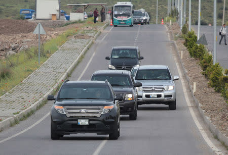 U.S. diplomatic vehicles arrive at Aliaga Prison and Courthouse complex in Izmir, Turkey April 16, 2018. REUTERS/Sadi Osman Temizel