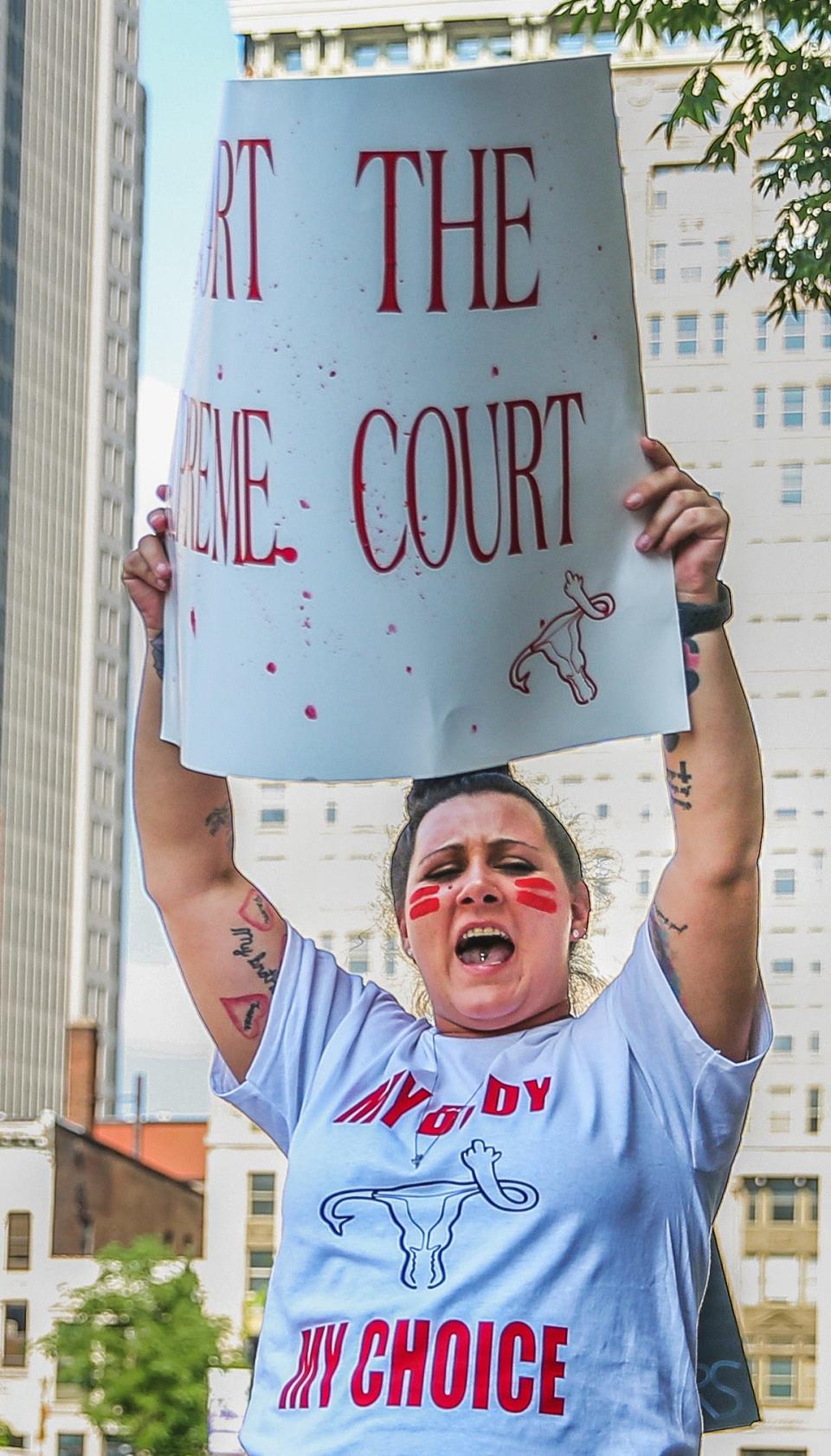 Brittney Bonner cheers at Rally for Women's Rights, a gathering supporting pro-choice, at Louisville Metro Hall in downtown Louisville on July 4, 2022. This comes after the Supreme Court overturned Roe V. Wade.