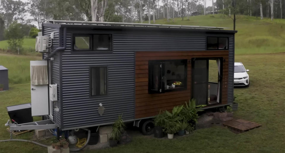A tiny home sits on a rural block of land near Eumundi, on the Sunshine Coast. The Council has ordered that the home be removed citing safety reasons.