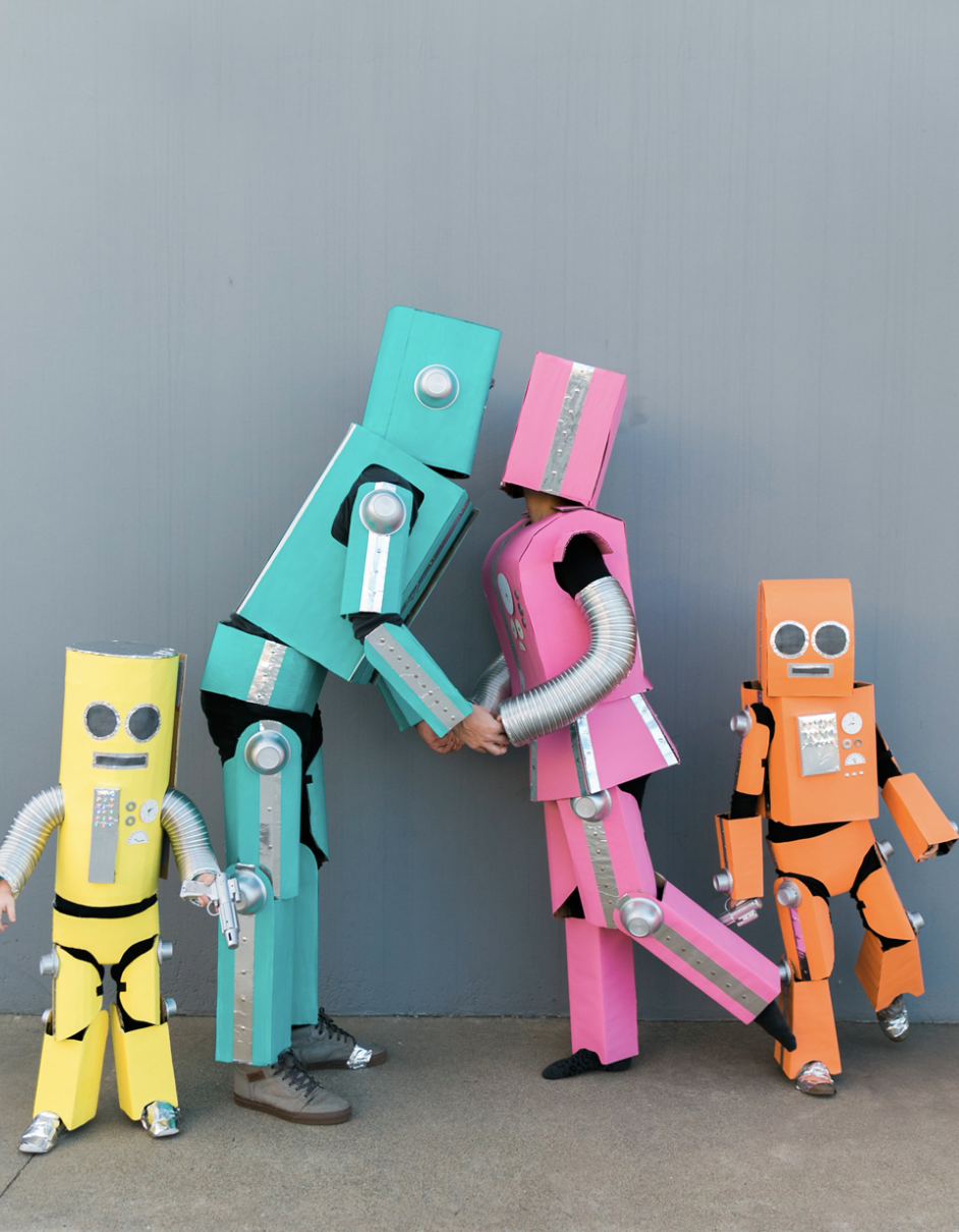 <p>"Beep, boop" your way into Halloween bash with these robot outfits. Simple cardboard boxes and colored paint are all that's needed to make these semi-realistic mechanical fits. </p><p><a href="https://tellloveandparty.com/2017/09/diy-robot-family-costume.html" rel="nofollow noopener" target="_blank" data-ylk="slk:Get the tutorial at Tell Love and Party »;elm:context_link;itc:0;sec:content-canvas" class="link "><em>Get the tutorial at Tell Love and Party »</em></a></p>