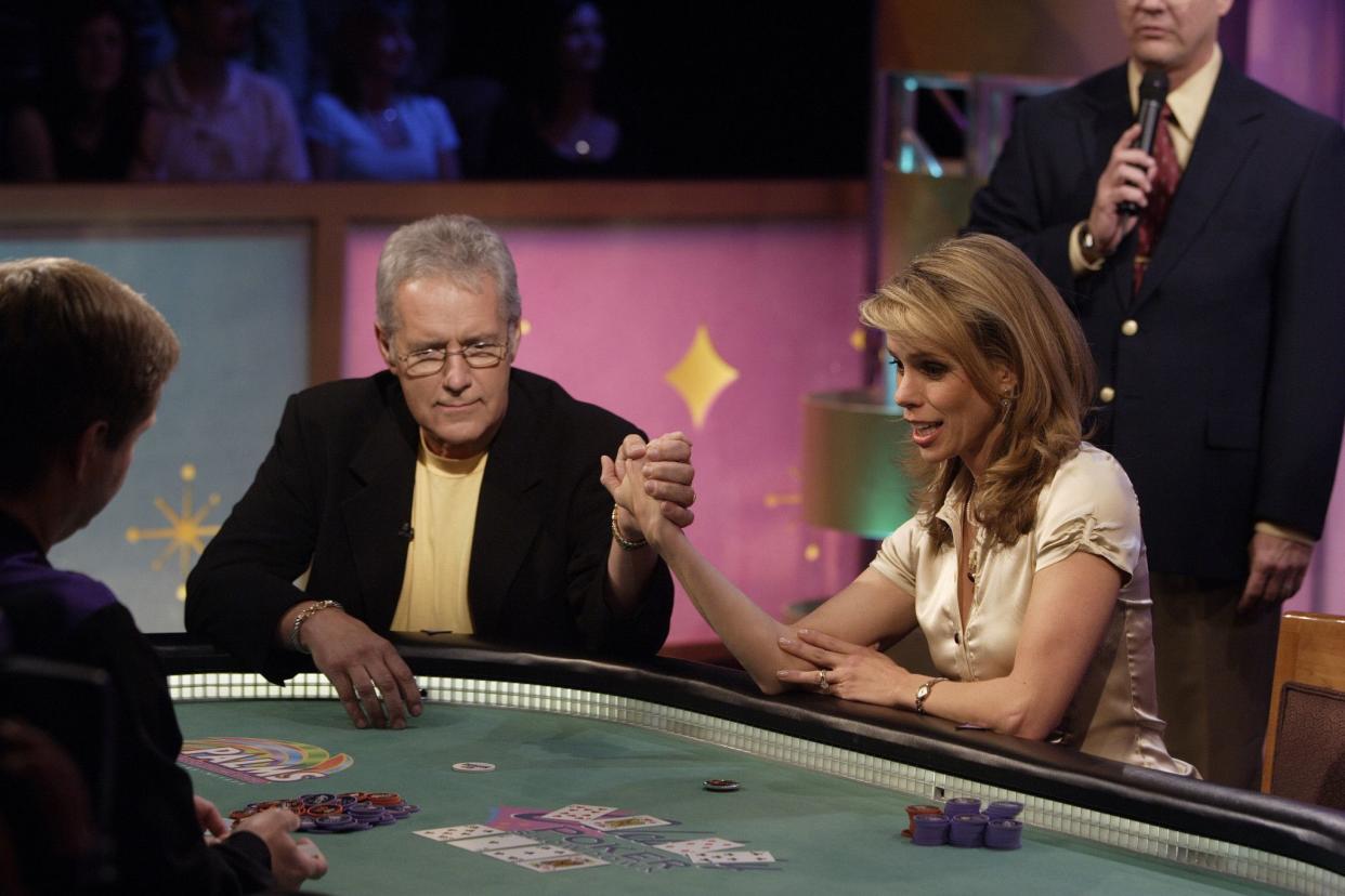 Alex Trebek and Cheryl Hines participate in the "Celebrity Poker Showdown" in 2005.