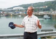 British Brexit Party leader Nigel Farage speaks during a visit at Dover harbour, in Dover