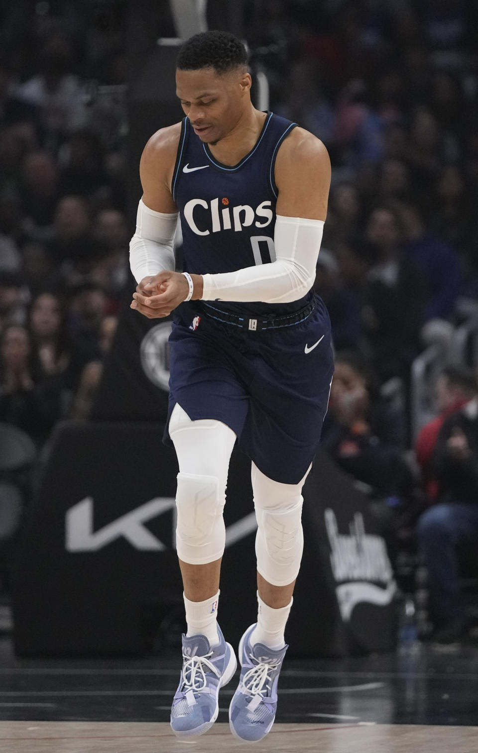 Los Angeles Clippers guard Russell Westbrook up the court during the first half of the team's NBA basketball game against the Washington Wizards, Friday, March 1, 2024, in Los Angeles. Westbrook fractured his left hand during the first half. (AP Photo/Ryan Sun)