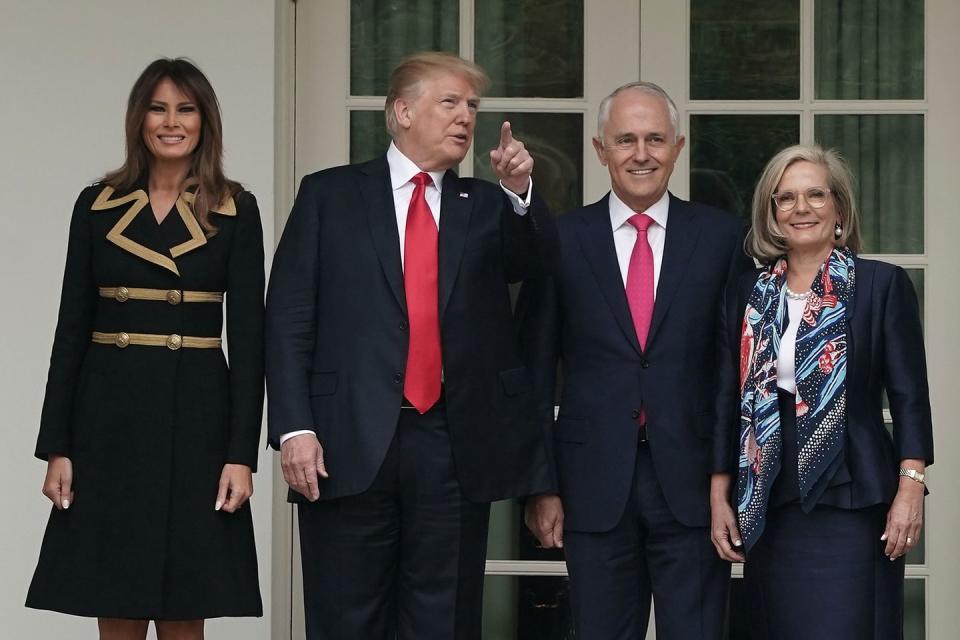 <p>In a subtly nautical look by Dolce & Gabbana, Mrs. Trump is seen here smiling alongside her husband and the Australian Prime Minister Malcolm Turnbull and his wide Lucy Turnball in February 2018. </p>