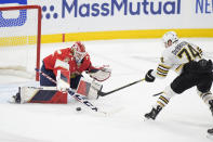 Boston Bruins left wing Jake DeBrusk (74) attempts a shot at Florida Panthers goaltender Sergei Bobrovsky (72) during the second period of Game 5 of the second-round series of the Stanley Cup Playoffs, Tuesday, May 14, 2024, in Sunrise, Fla. (AP Photo/Wilfredo Lee)