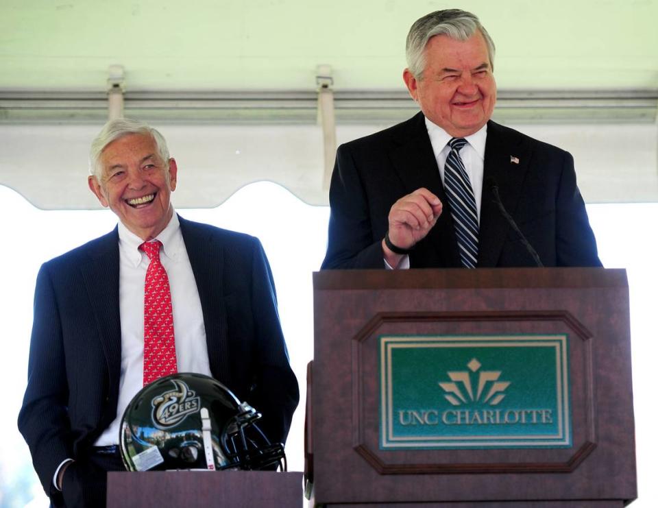 Hugh McColl Jr. (left) and Jerry Richardson laugh as they make comments following an announcement by UNC Charlotte Chancellor Dr. Philip Dubois and Director of Athletics Judy Rose announcing the naming of the Charlotte 49ers football field as McColl-Richardson Field on Nov. 1, 2011. McColl is a former Chairman and CEO of Bank of America and Richardson, at the time, was the owner of the Carolina Panthers.