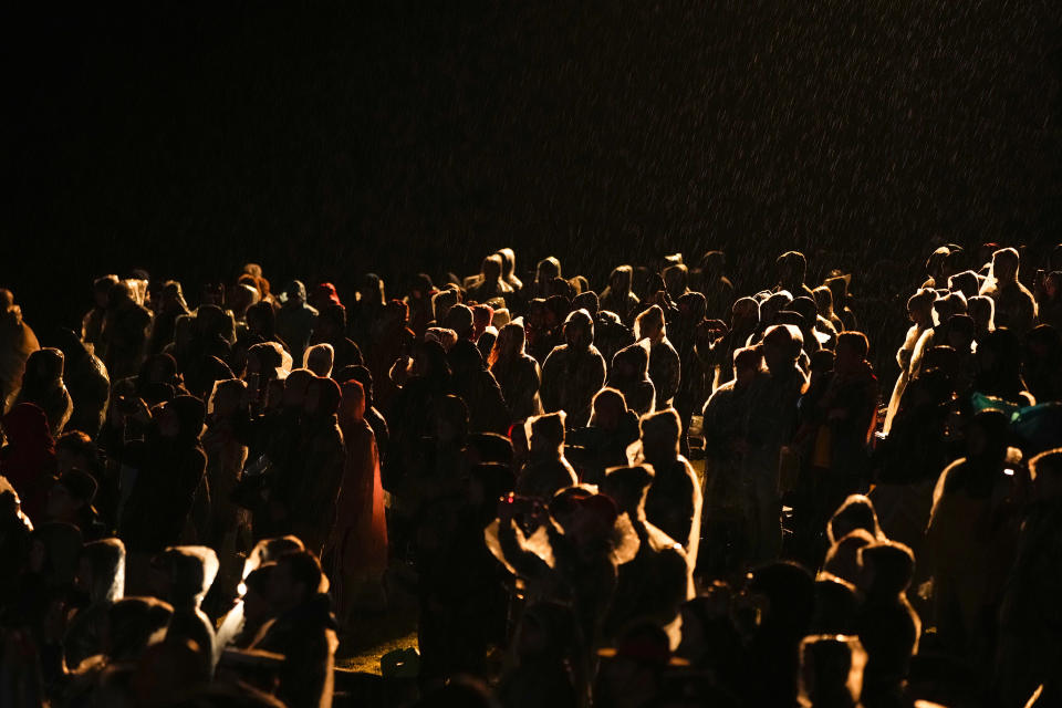 People gather to attend the Dawn Service ceremony at the Anzac Cove beach, the site of the April 25, 1915, World War I landing of the ANZACs (Australian and New Zealand Army Corps) on the Gallipoli peninsula, Turkey, early Tuesday, April 25, 2023. During the 108th Anniversary of Anzac Day, people from Australia and New Zealand joined Turkish and other nations' dignitaries at the former World War I battlefields for a dawn service Tuesday to remember troops that fought during the Gallipoli campaign between British-led forces against the Ottoman Empire army. (AP Photo/Emrah Gurel)