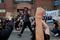 Protesters rally against the death in Minneapolis police custody of George Floyd in Boston