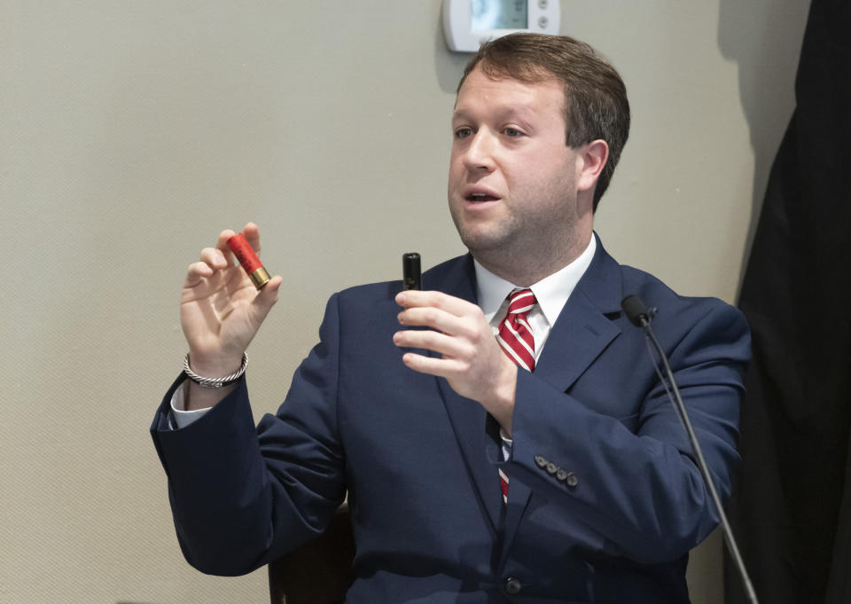 Firearms examiner Paul Greer describes shotgun shells during Alex Murdaugh's double murder trial at the Colleton County Courthouse in Walterboro, S.C., Friday, Feb. 3, 2023. The 54-year-old attorney is standing trial on two counts of murder in the shootings of his wife and son at their Colleton County home and hunting lodge on June 7, 2021. (Sam Wolfe/The State, Pool)