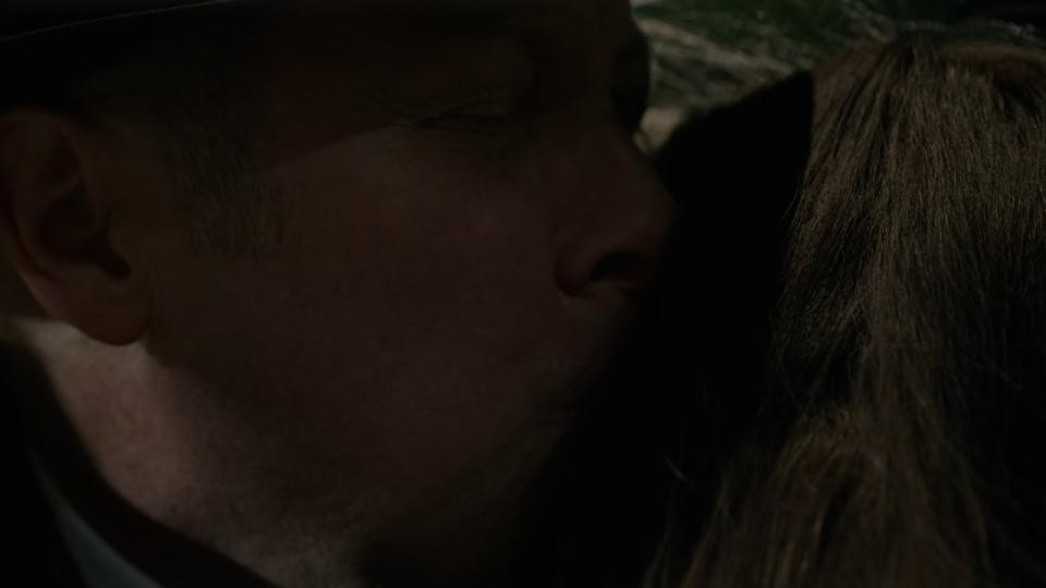 Reddingron kissing Elizabeth Keen on the head as she dies in The Blacklist