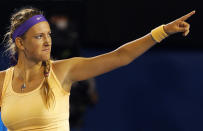 Victoria Azarenka of Belarus celebrates defeating Li Na of China during their women's singles final match at the Australian Open tennis tournament in Melbourne, January 26, 2013. REUTERS/Damir Sagolj (AUSTRALIA - Tags: SPORT TENNIS TPX IMAGES OF THE DAY) - RTR3CZFN