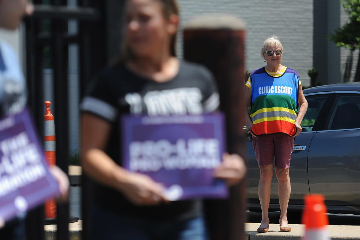 A clinic escort is seen during an anti-abortion rally outside the Planned Parenthood Reproductive Health Center in St Louis, Missouri on June 4, 2019.