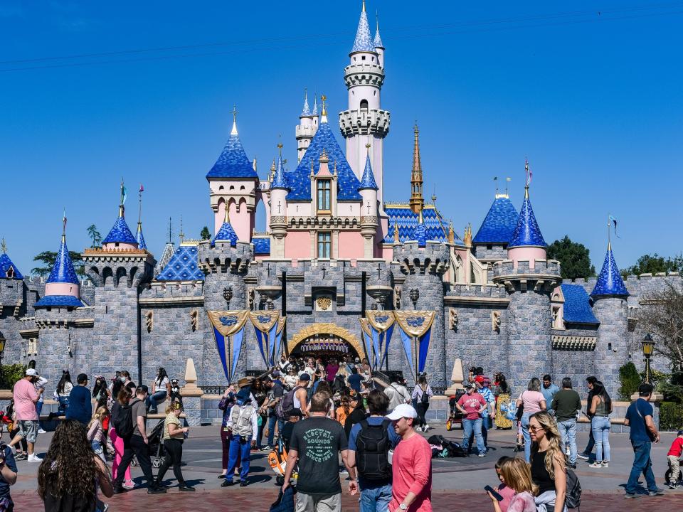 an exterior shot of sleeping beauty castle during a day at disneyland