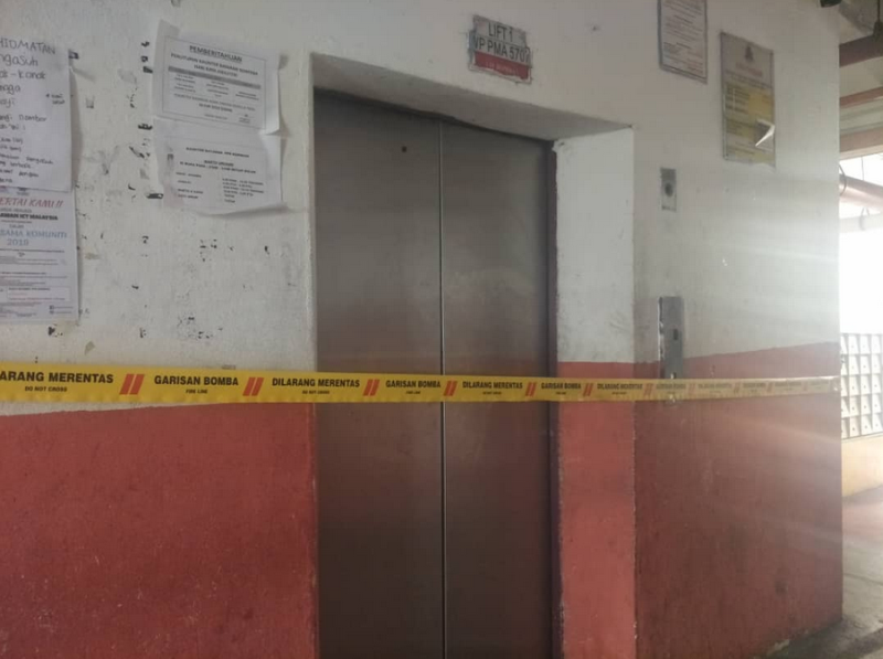 The lift is cordoned off after the incident. — Picture via Twitter/Bernamadotcom