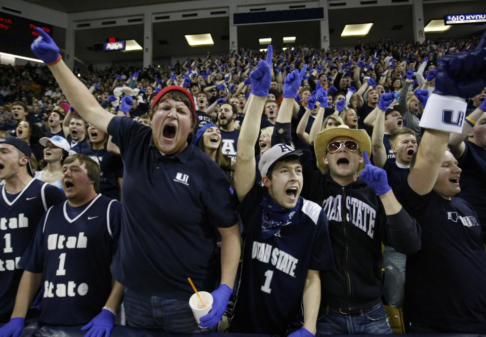 Utah State Aggies fans cheer on their team during game against Nevada in Logan, Utah, Wednesday, Feb. 2, 2011. The new faces in Logan this season are looking forward to the mayhem Aggie Nation is known for. | Colin E Braley, Associated Press