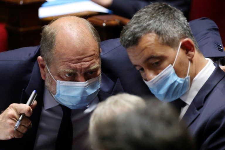 Eric Dupond-Moretti (G) et Gérald Darmanin (D) à l'Assemblée nationale, le 15 juin 2021 à Paris  - THOMAS COEX © 2019 AFP