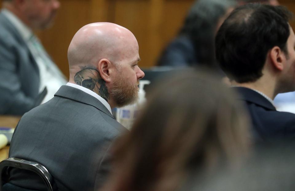 Robert James Watson III, looks on from his seat in the courtroom as the trial for him, his brother Johnny James Watson and Danie Jay Kelly Jr. begins in Kitsap County Superior Court on Monday, Nov. 27, 2023.