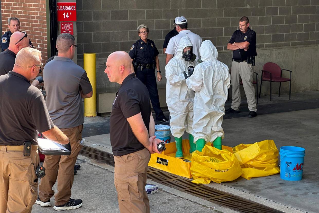 <span>A hazmat crew investigates after a suspicious package was delivered to election officials at the Missouri secretary of state’s office in Jefferson City on Tuesday.</span><span>Photograph: Summer Ballentine/AP</span>